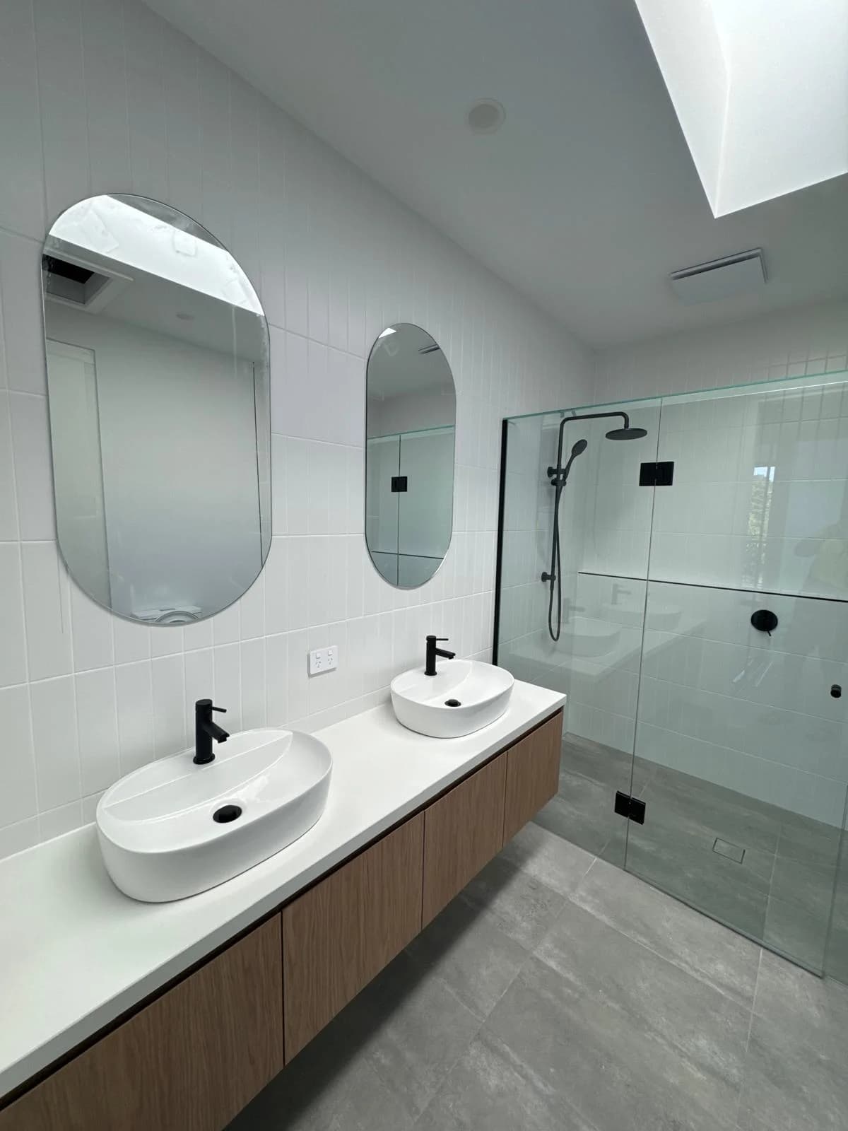 Luxury bathroom renovation with large format porcelain tiles